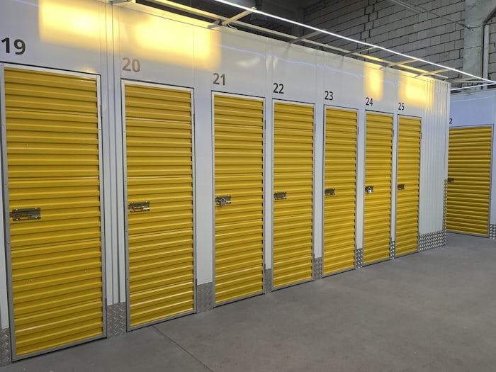 Row of bright storage unit doors